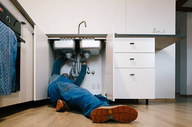 Professional Drain Cleaning technician working in Perry, IA